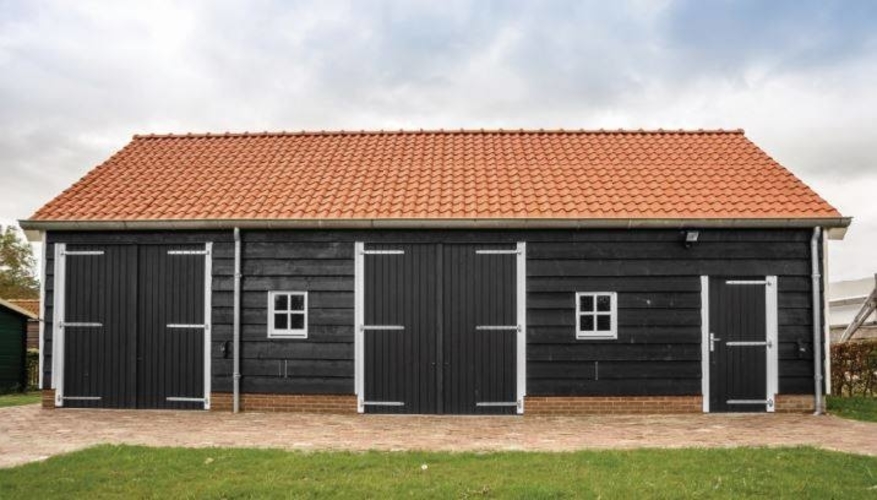 Verrijk je tuin door zelf een houten schuur te bouwen